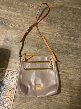Dooney & Bourke grayish taupe Leather Crossbody Bag with Tan Trim